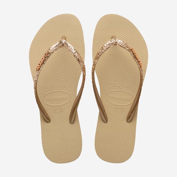 Les Havaianas Slim Glitter II, aussi recherchées sous le nom Havaianas Slim Glitter, sont des tongs femme à brides fines pailletées…